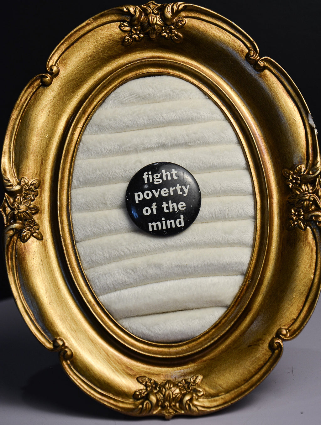fight the poverty of the mind pin