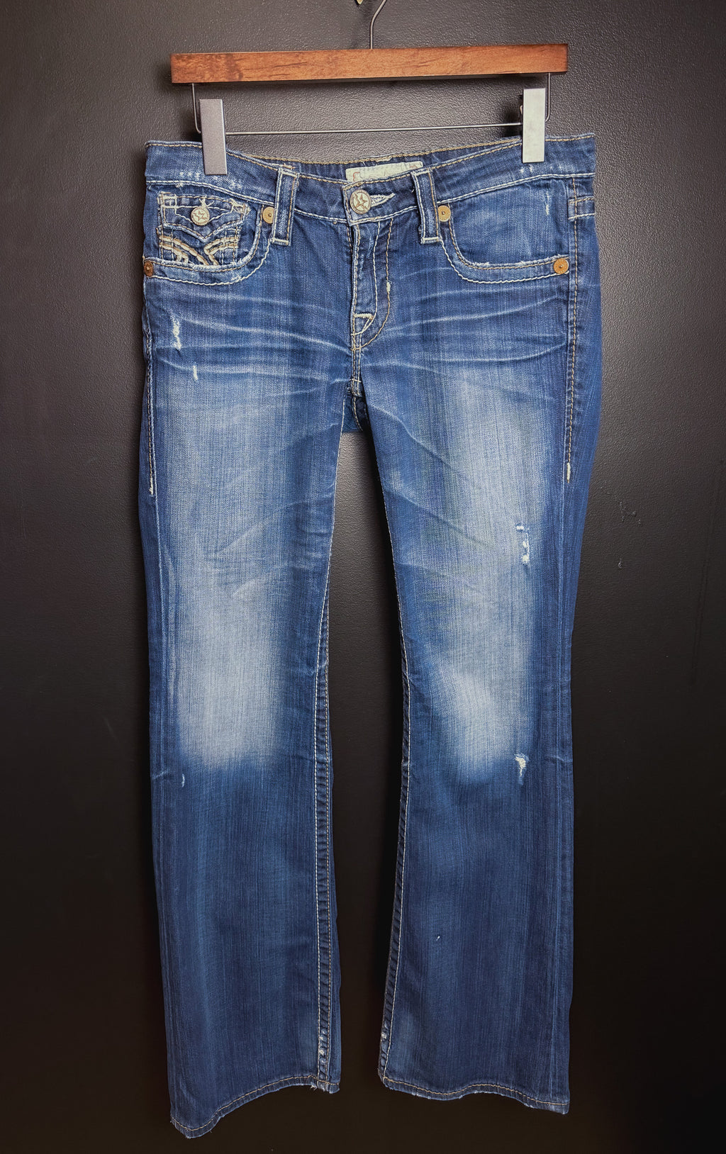 Buckle Low Rise Bootcut Jeans