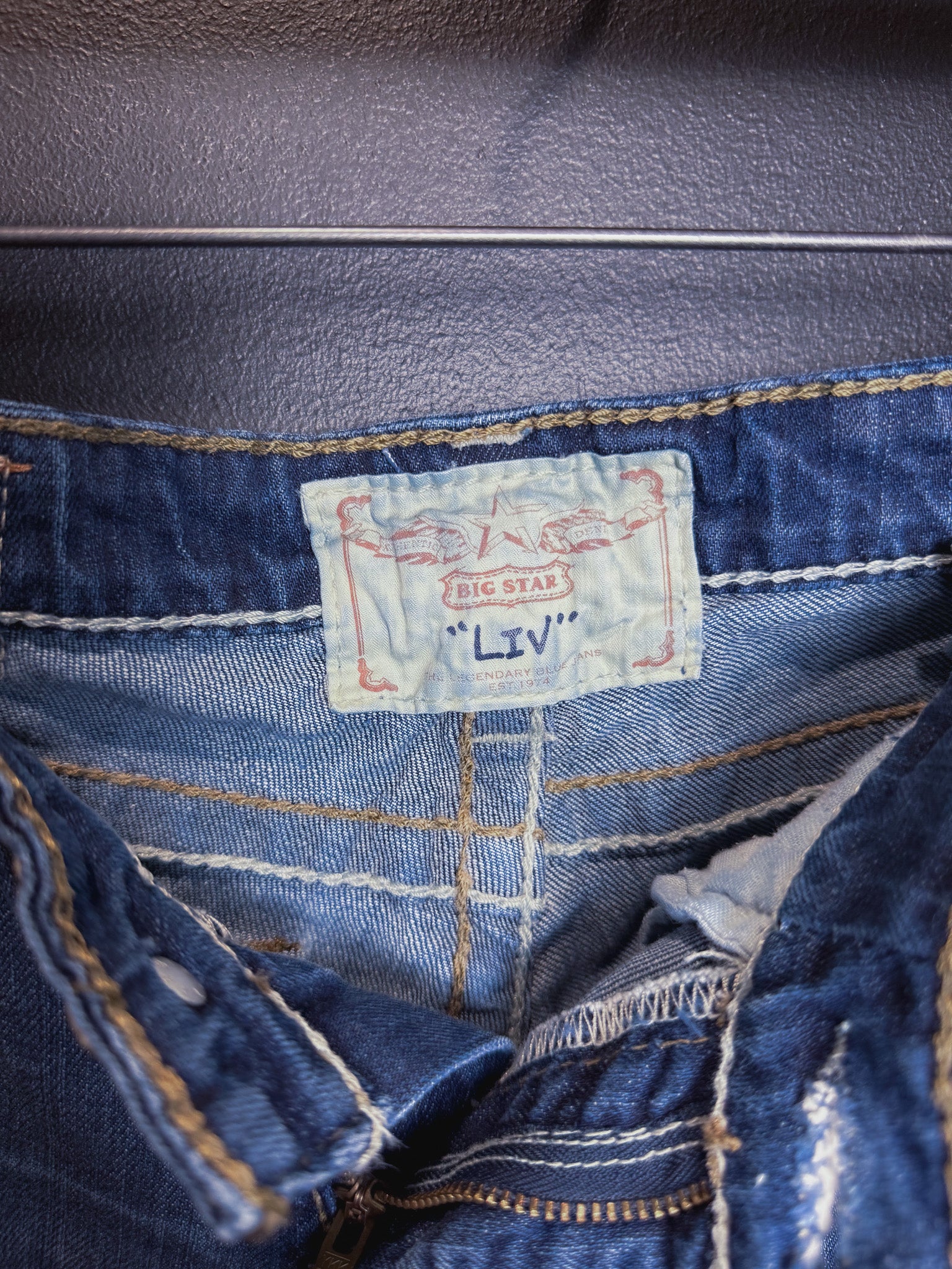 Buckle Low Rise Bootcut Jeans