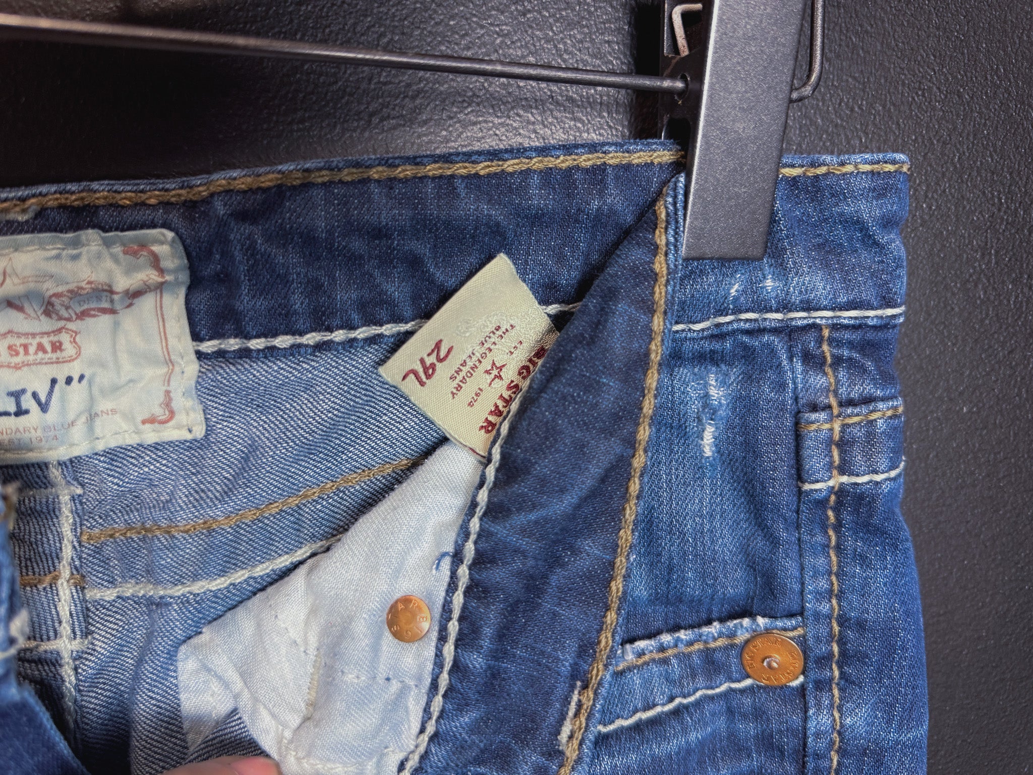 Buckle Low Rise Bootcut Jeans