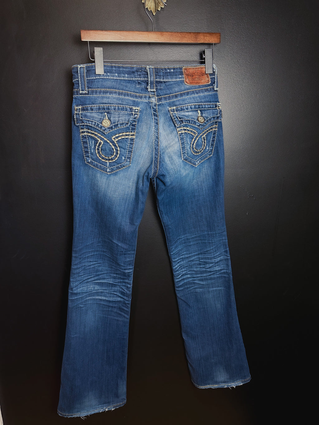Buckle Low Rise Bootcut Jeans